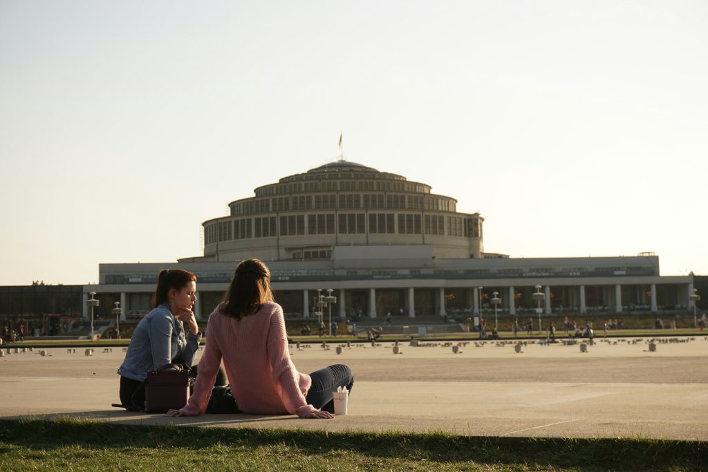 Centennial Hall in Wroclaw with visitors relaxing