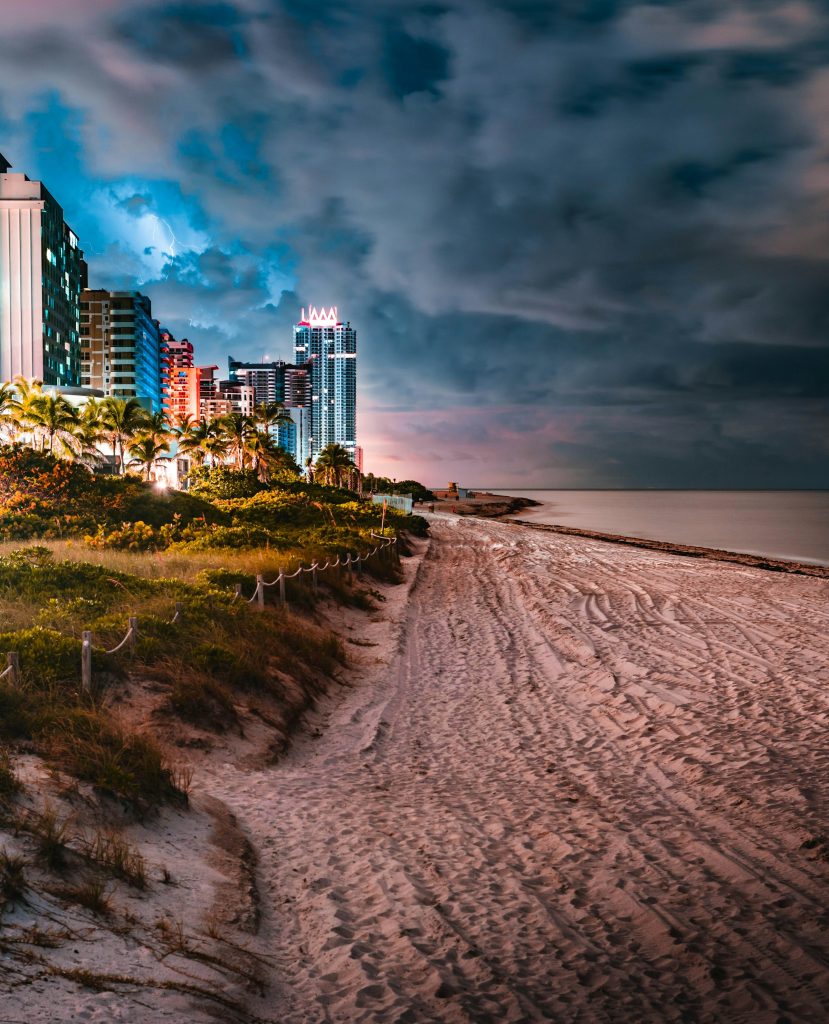 Miami beach skyline with storm clouds at sunset